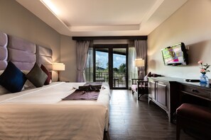 Deluxe Room, Garden View | Minibar, in-room safe, desk, rollaway beds - Nora Beach Resort and Spa (Koh Samui)