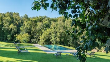 Seasonal outdoor pool, pool umbrellas, pool loungers
