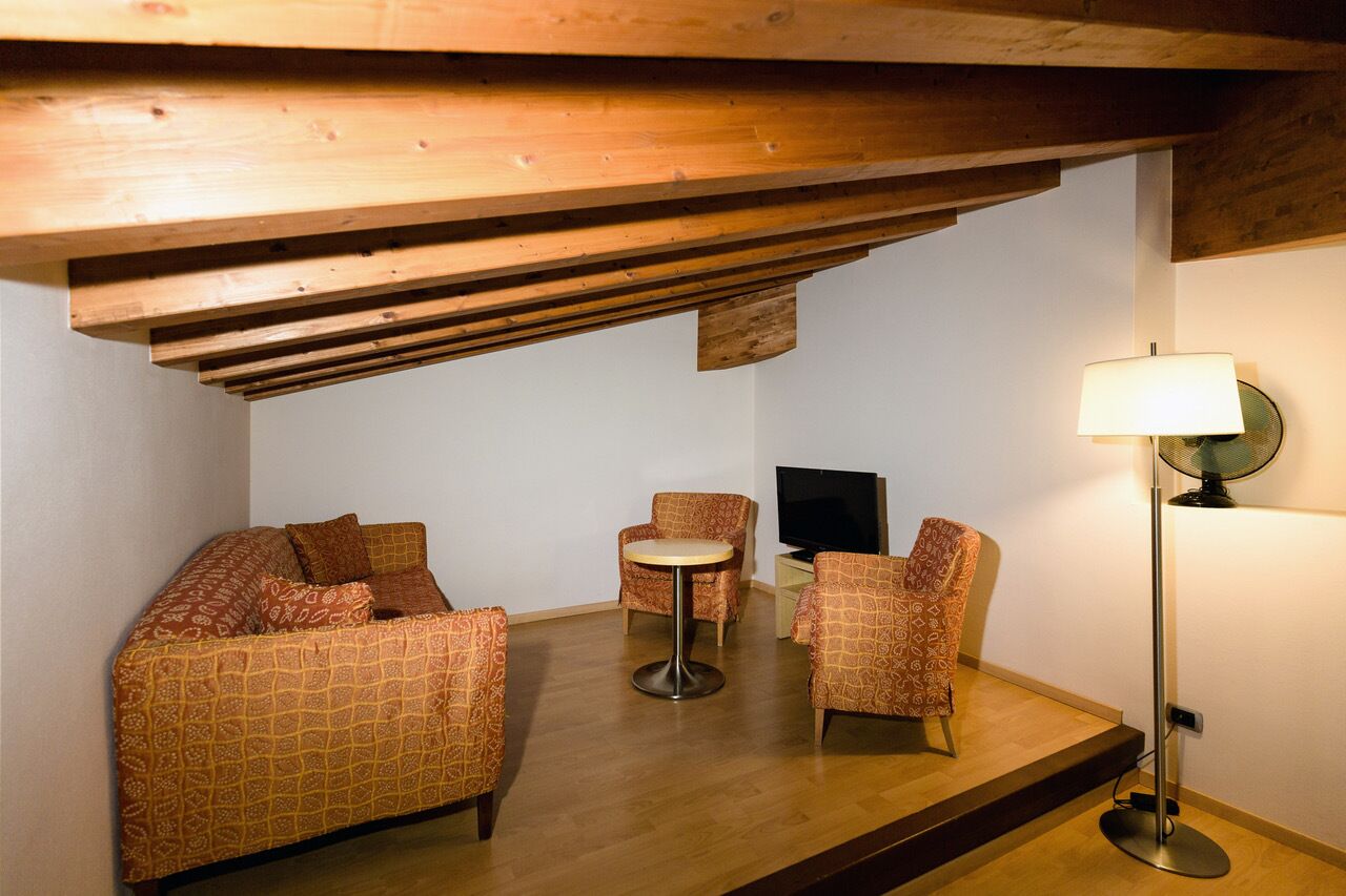 junior suite, balcony, garden view (4 people) | living area | flat-screen tv