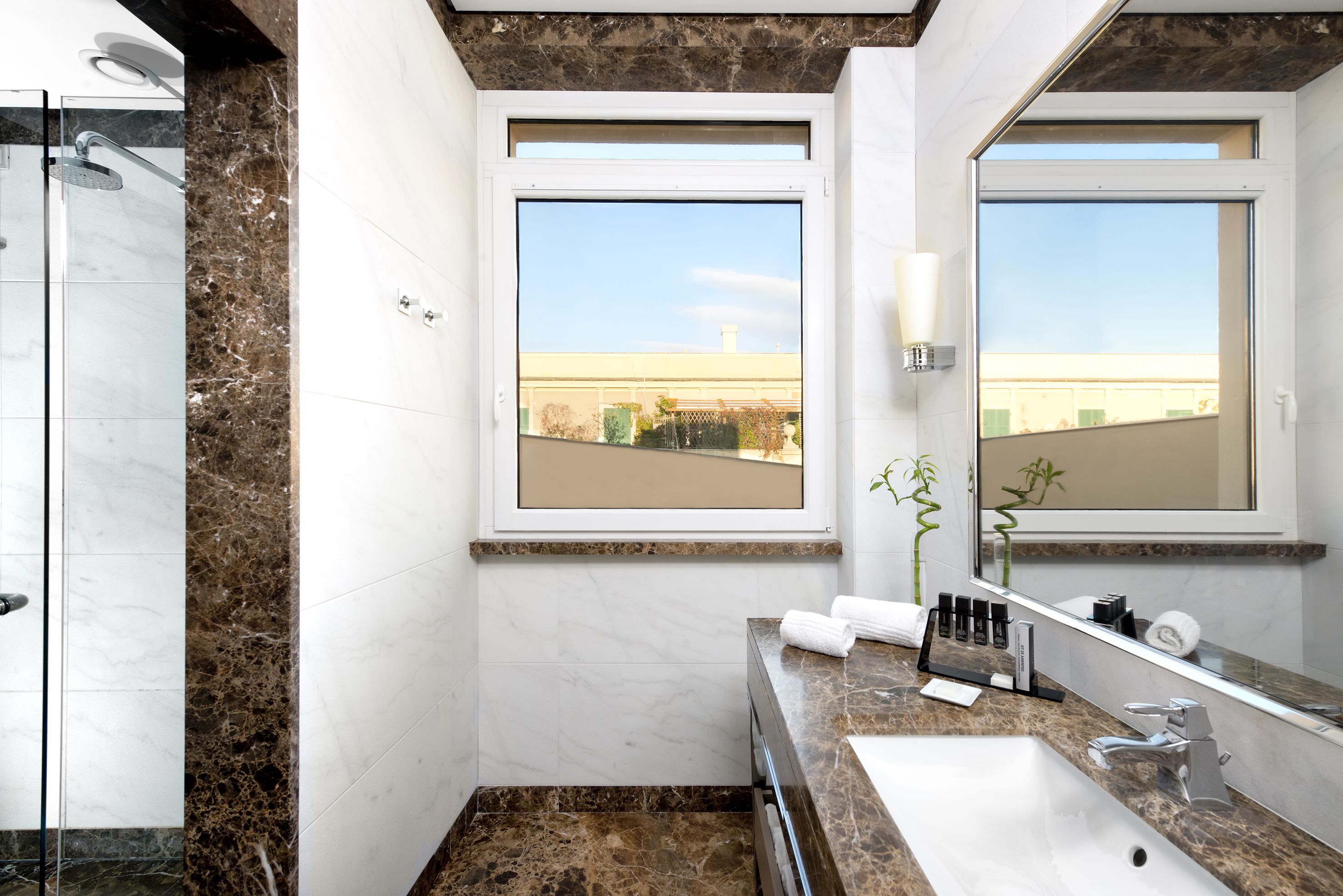 junior suite with terrace and spa access | bathroom | deep-soaking bathtub, free toiletries, hair dryer, bathrobes