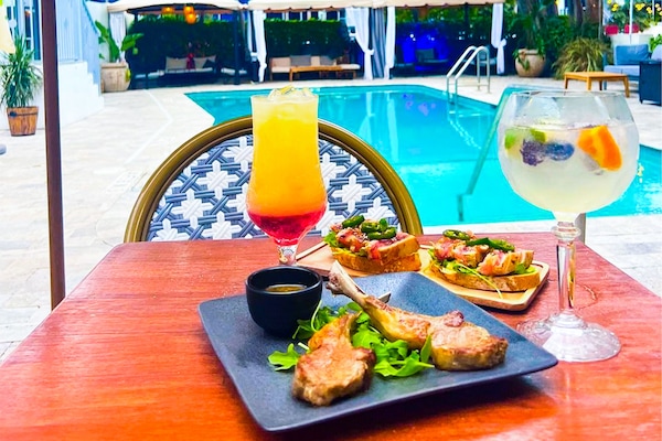 Lunch, dinner served; Spanish cuisine, pool views