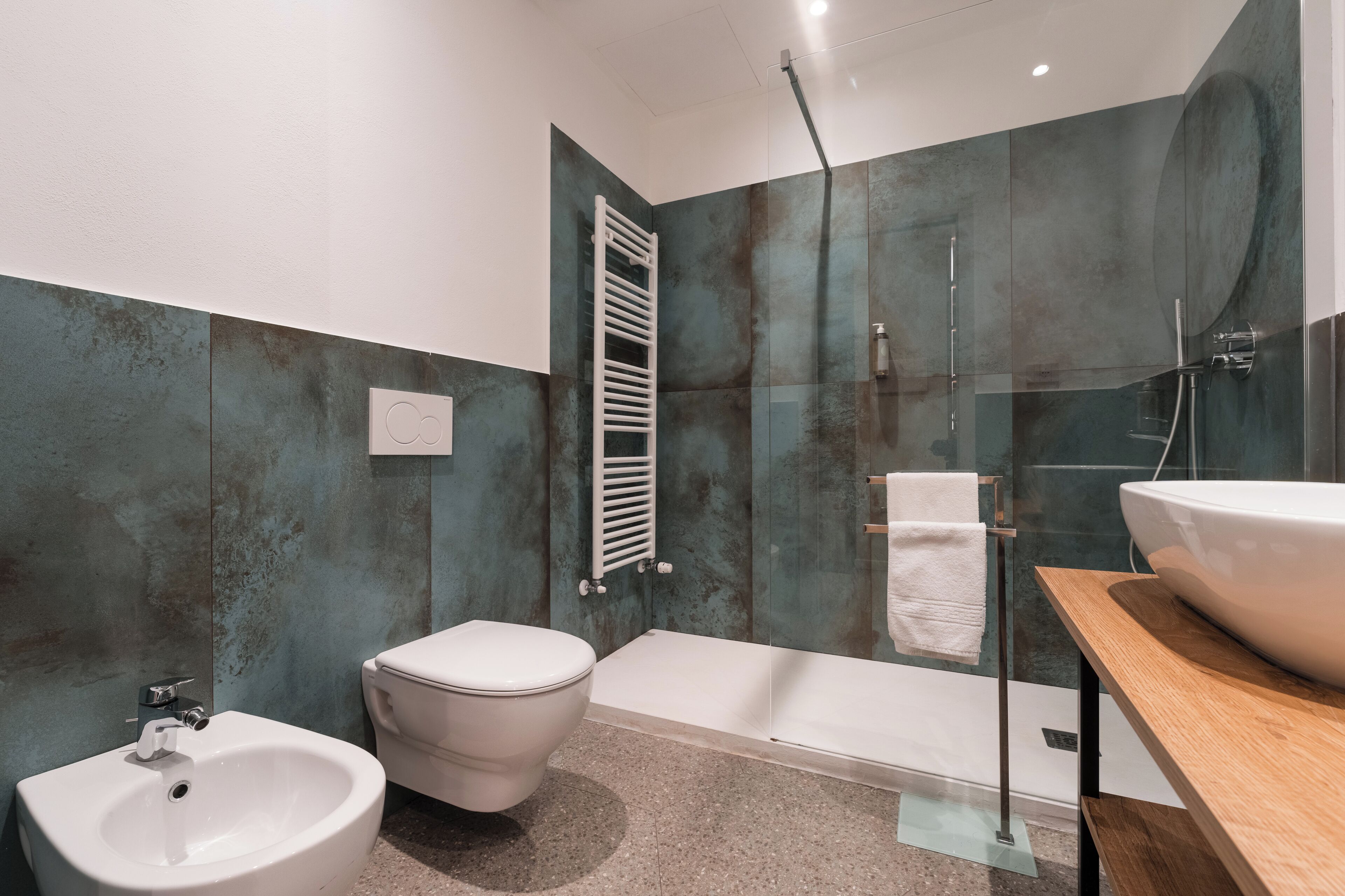 family suite | bathroom | shower, eco-friendly toiletries, hair dryer, bidet