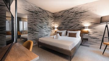 Family Suite | 2 bedrooms, down comforters, minibar, in-room safe