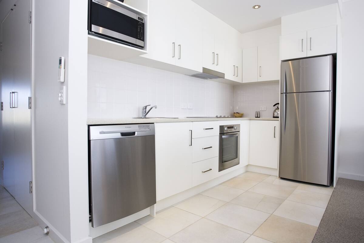 two bedroom apartment | private kitchen | fridge, coffee/tea maker, electric kettle, cookware/dishes/utensils