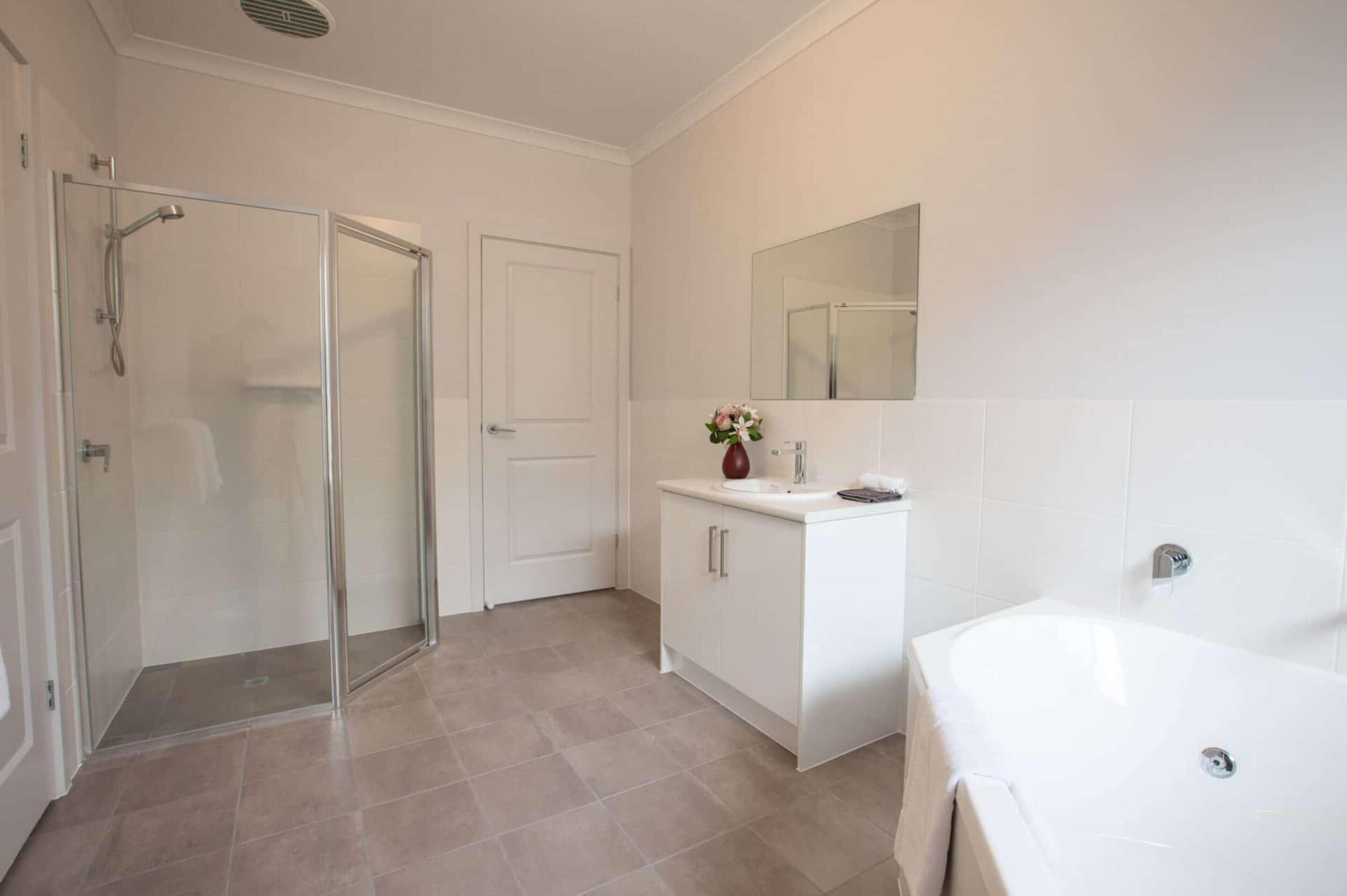 4 bedroom apartment | bathroom | separate bathtub and shower, jetted bath, hair dryer, towels