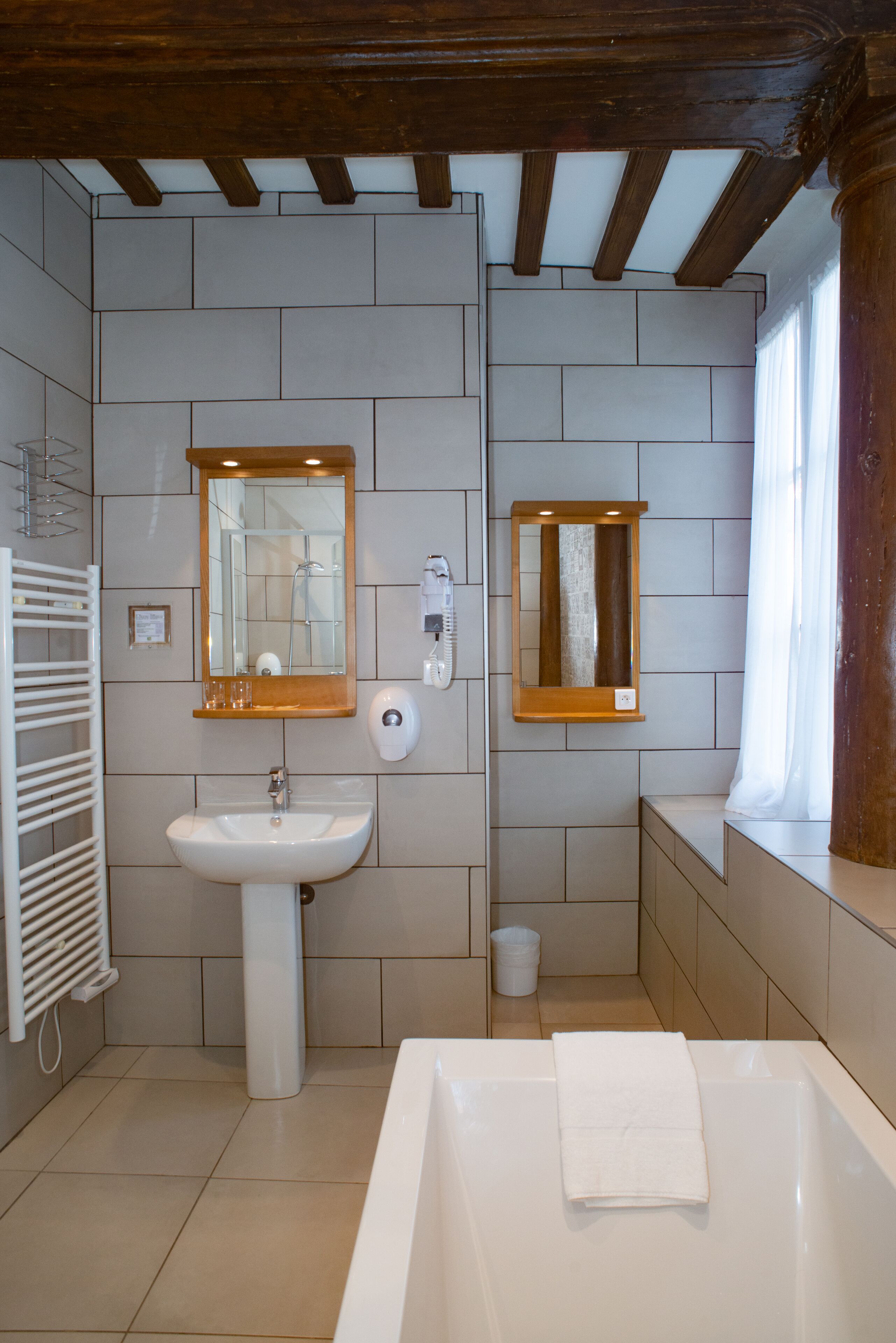 superior quadruple room - castle view | bathroom | free toiletries, hair dryer, towels, soap