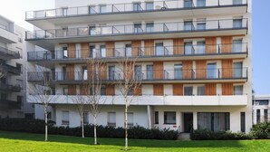 A multi-story residential building with balconies, a flat roof, and a modern architectural style. - Residhome Appart Hotel Nancy Lorraine (Nancy)