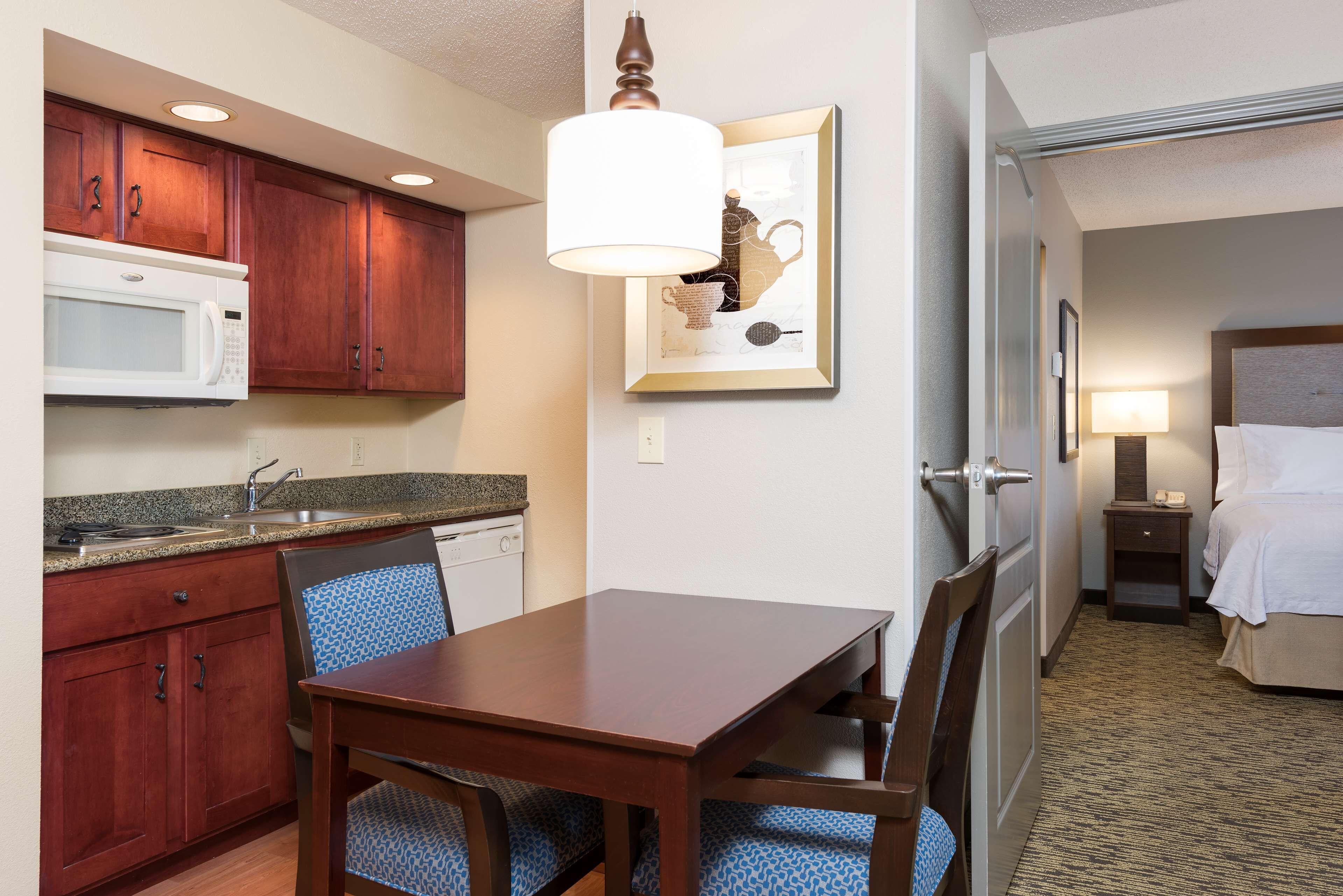 suite, 1 bedroom | private kitchen | full-sized fridge, microwave, stovetop, dishwasher
