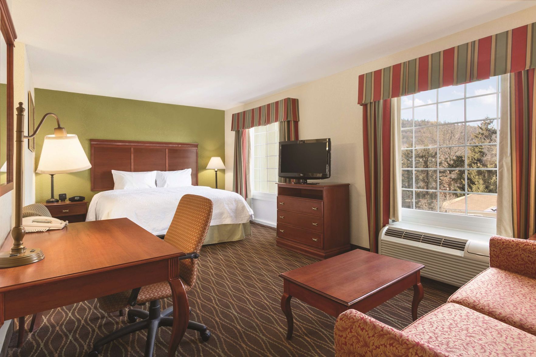 Down comforters, desk, blackout drapes, soundproofing