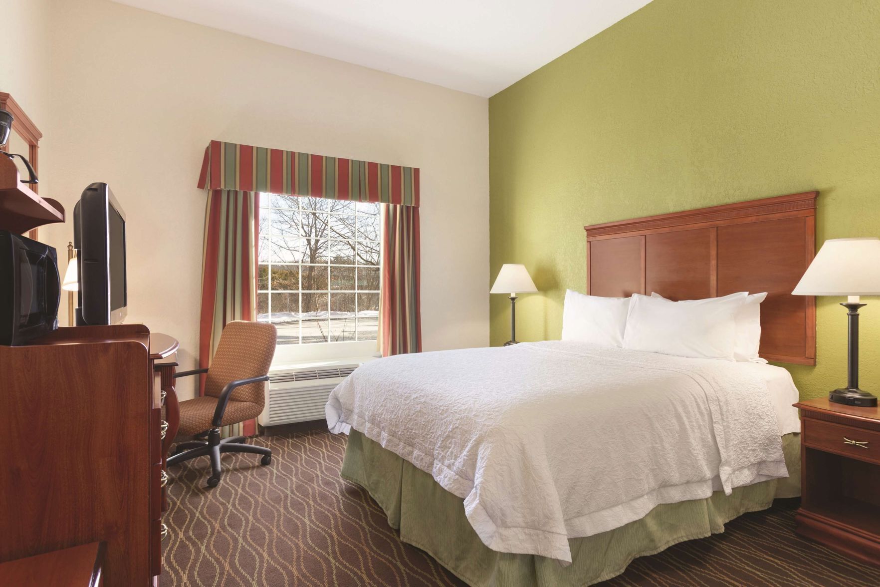 Down comforters, desk, blackout drapes, soundproofing