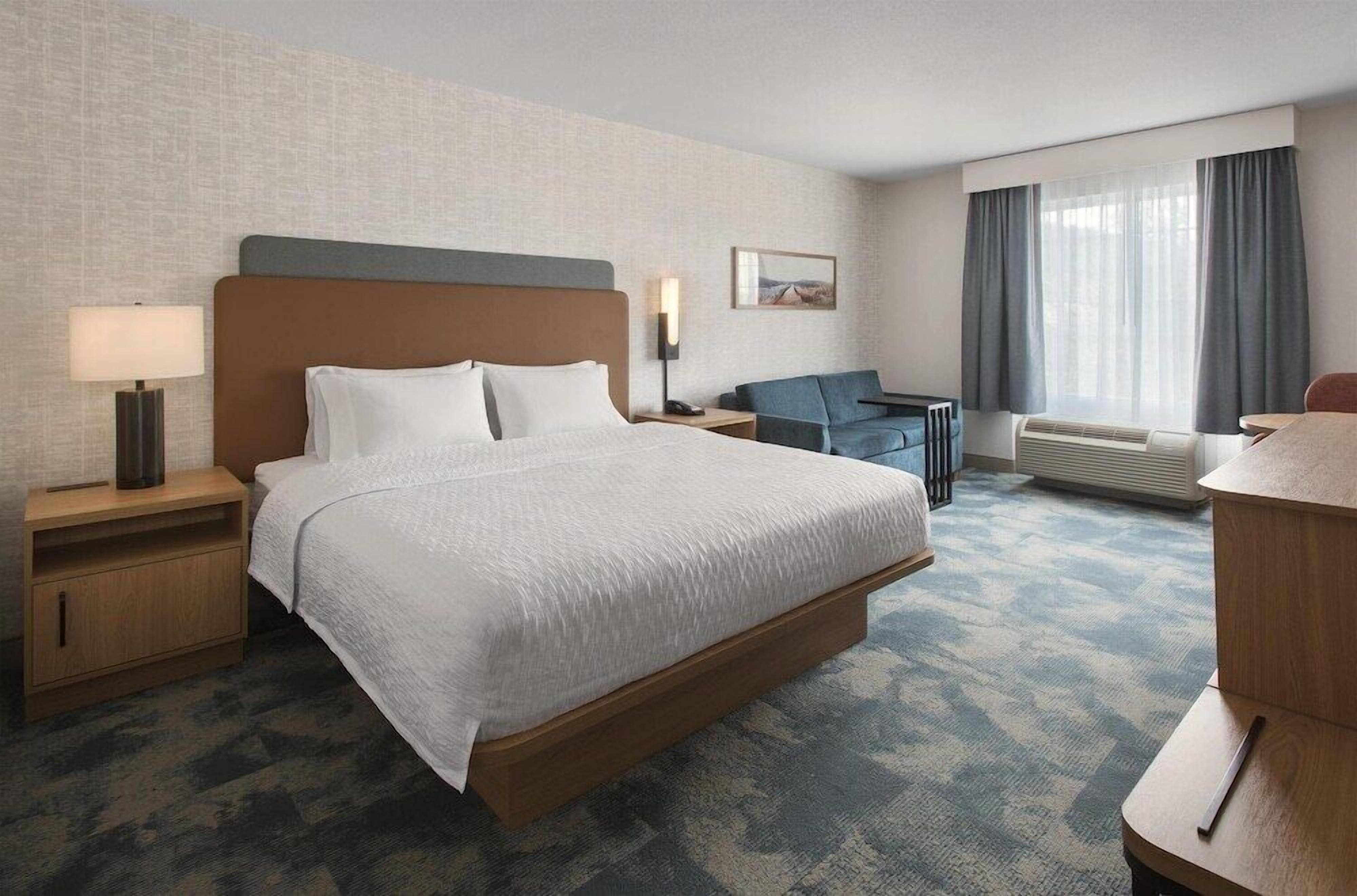 Down comforters, desk, blackout drapes, soundproofing