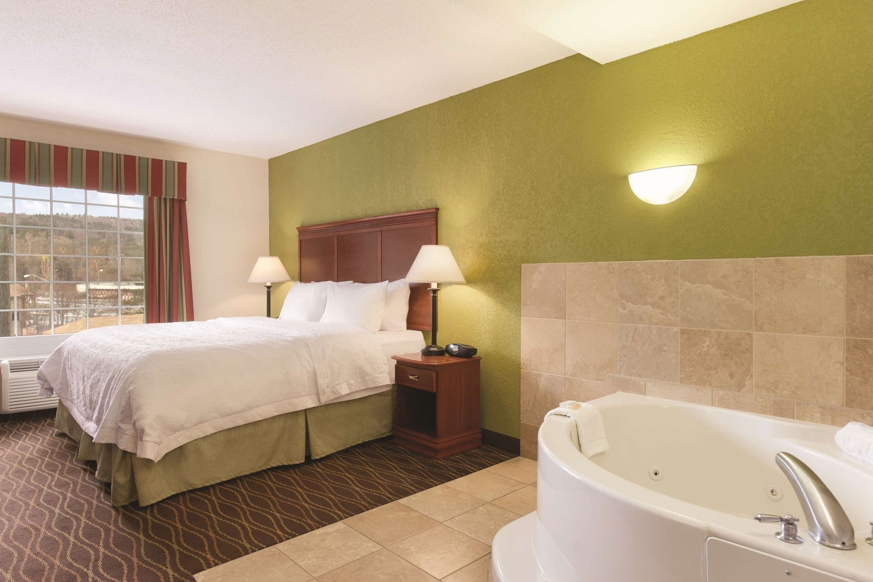Down comforters, desk, blackout drapes, soundproofing