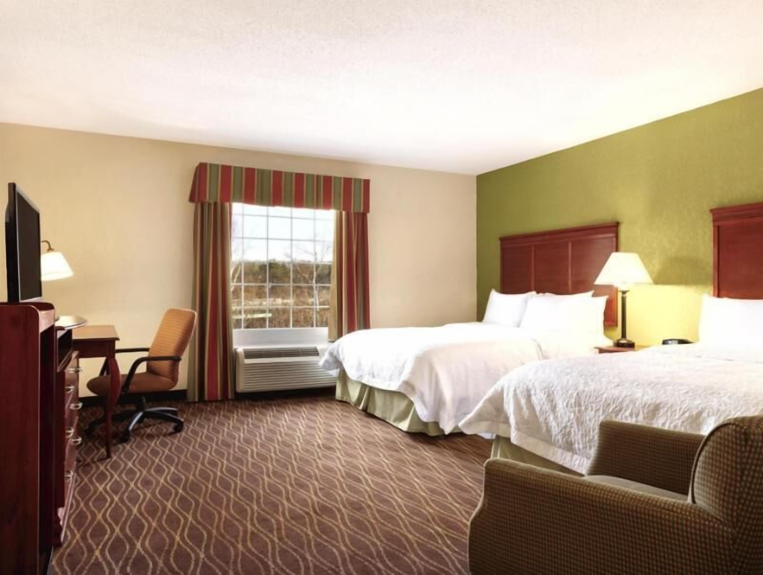Down comforters, desk, blackout drapes, soundproofing
