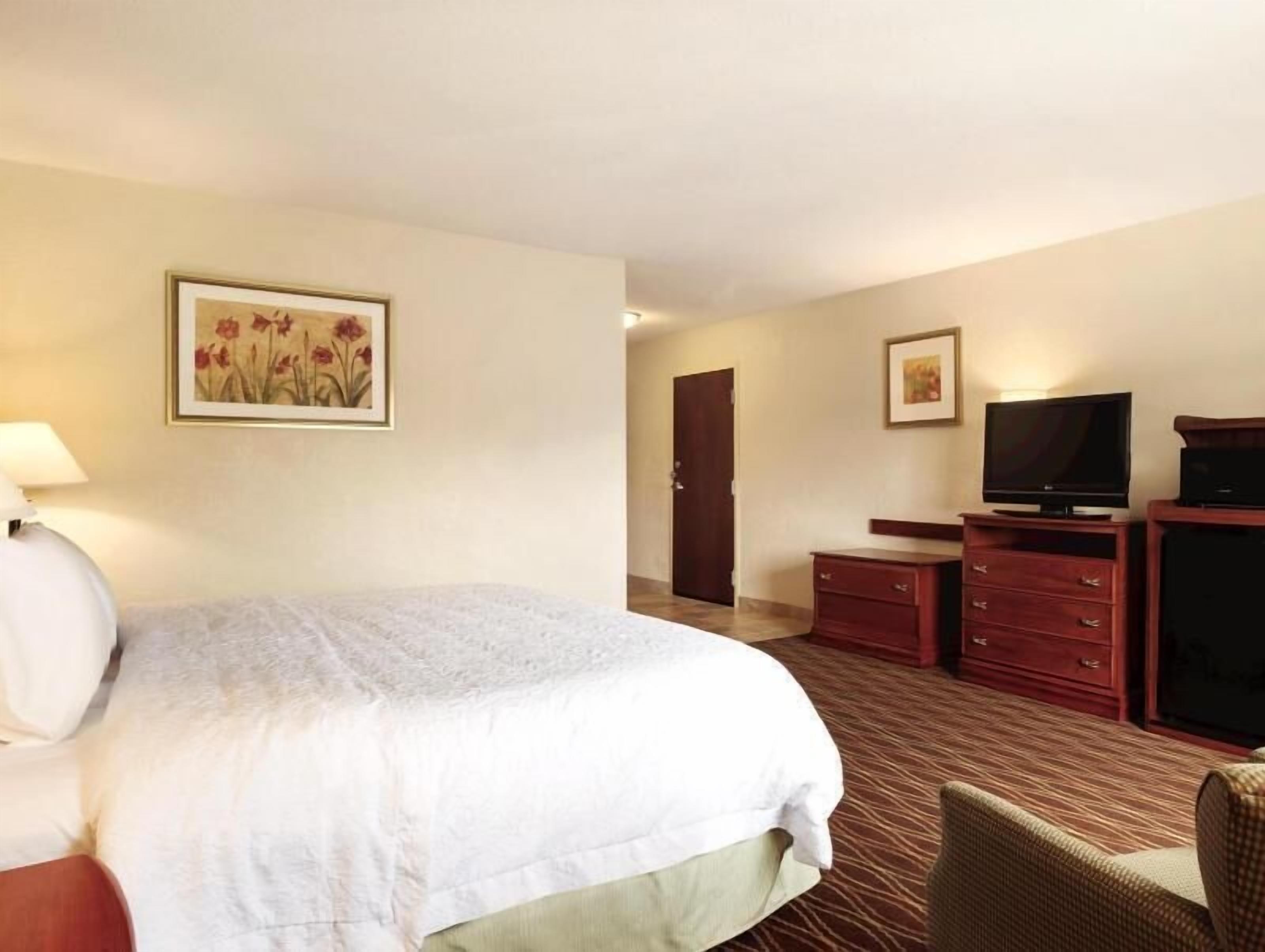 Down comforters, desk, blackout drapes, soundproofing