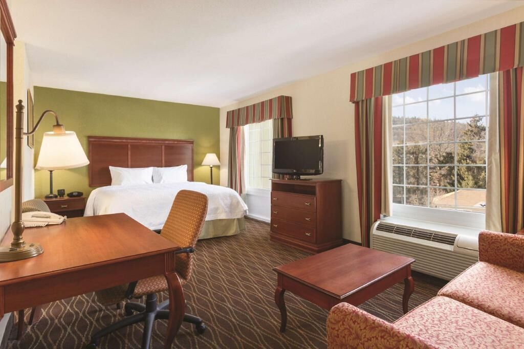 Down comforters, desk, blackout drapes, soundproofing