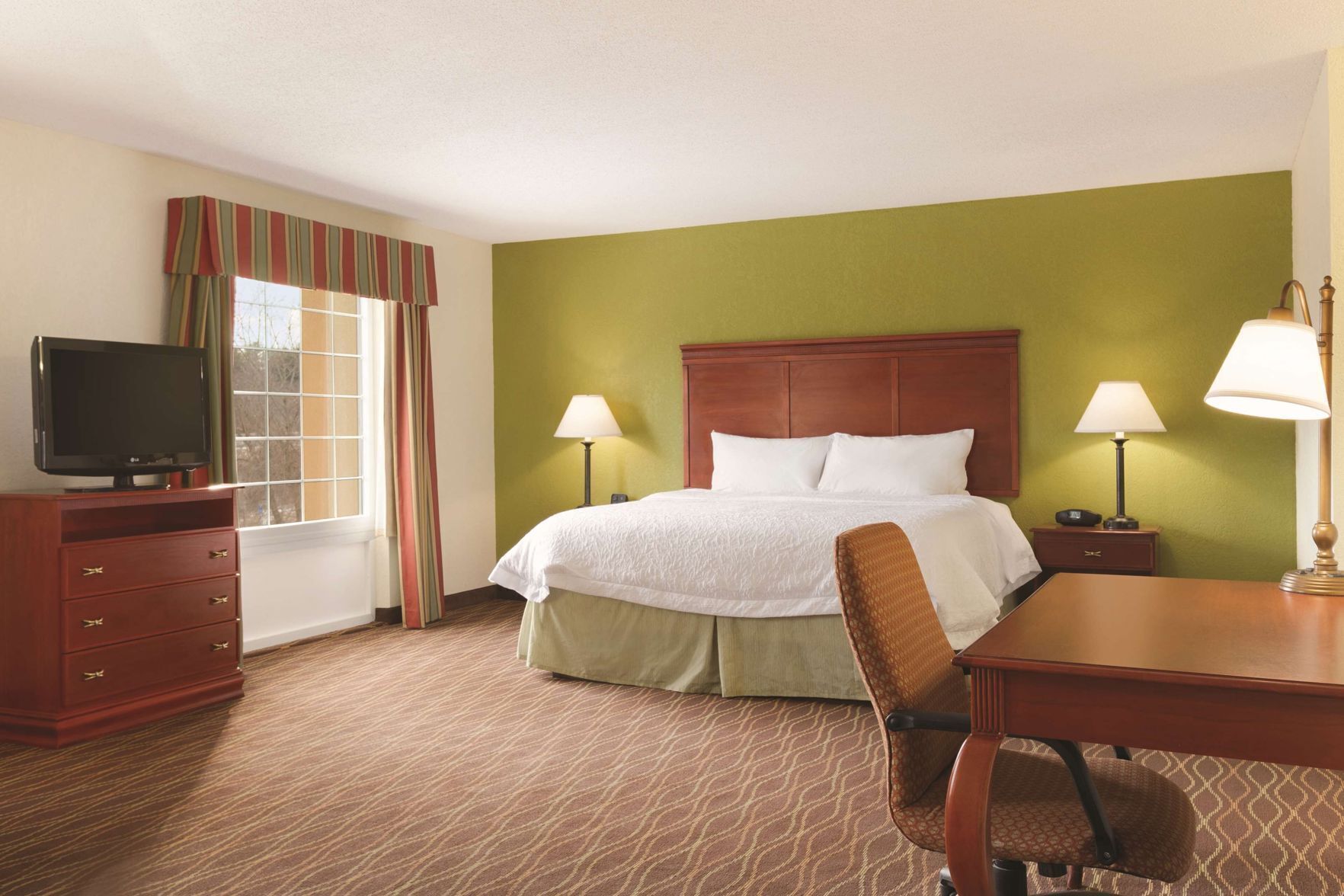 Down comforters, desk, blackout drapes, soundproofing