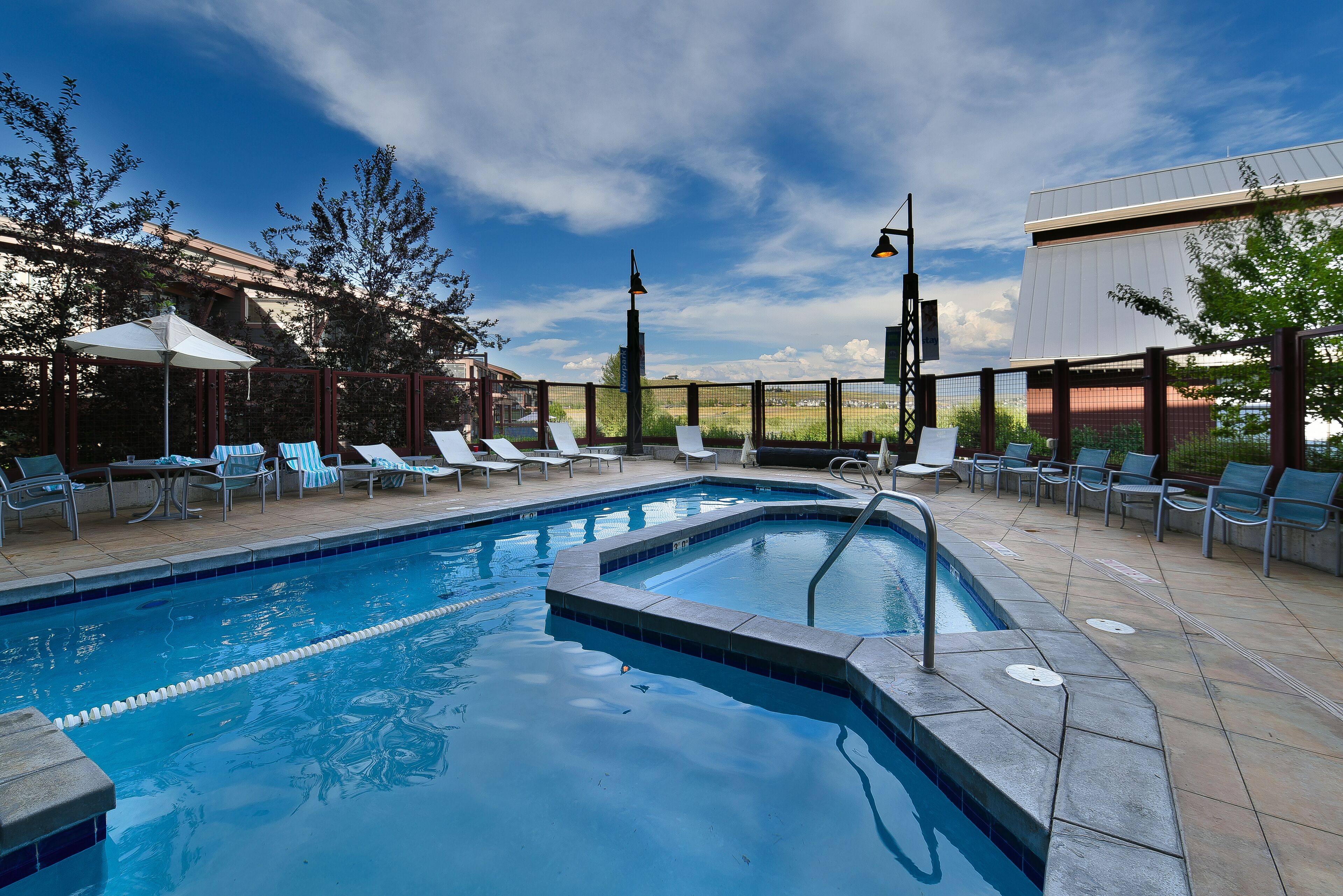 indoor pool, outdoor pool, open 6:00 am to 10:00 pm, pool umbrellas