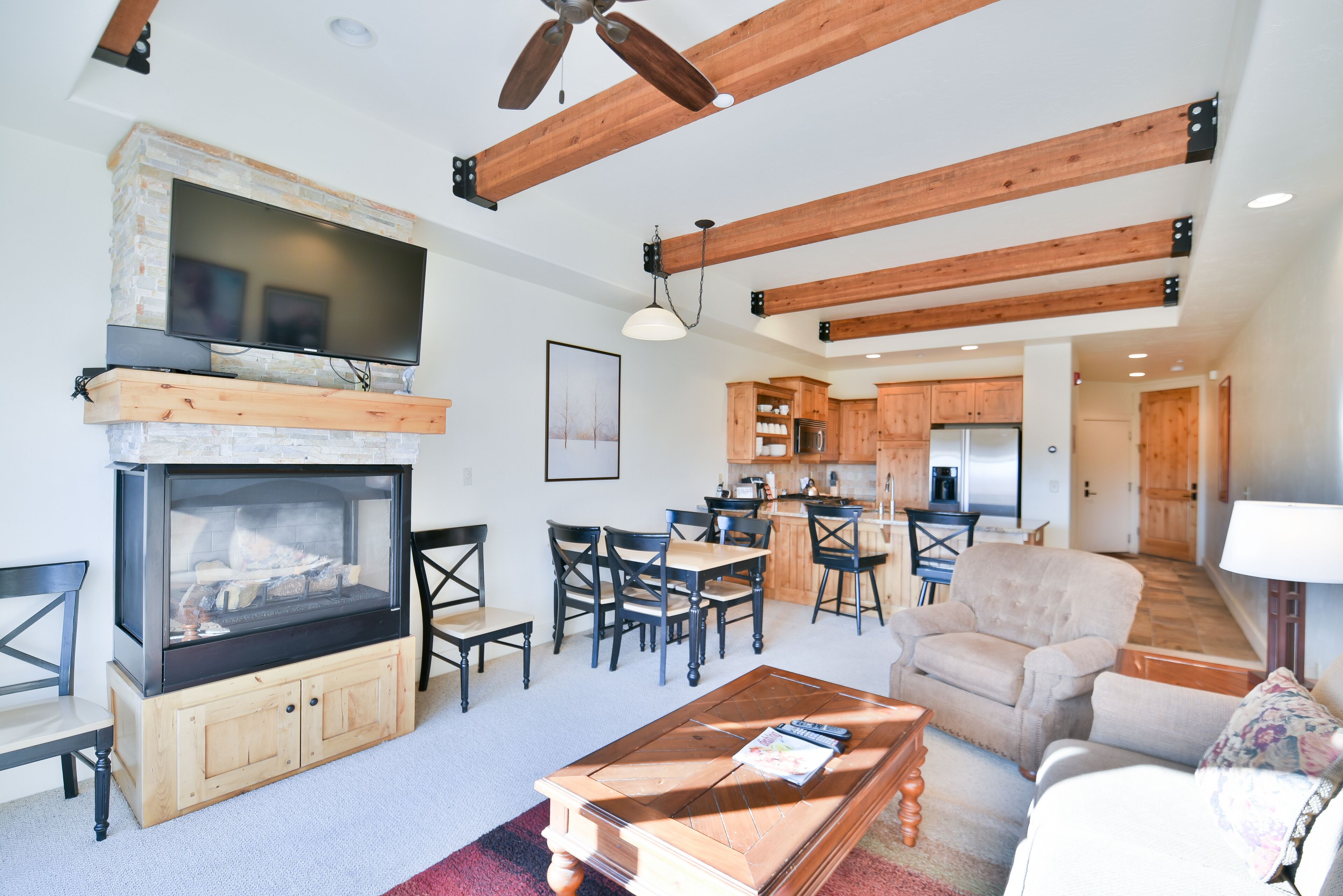 townhome, multiple beds, hot tub, mountain view | living area | fireplace