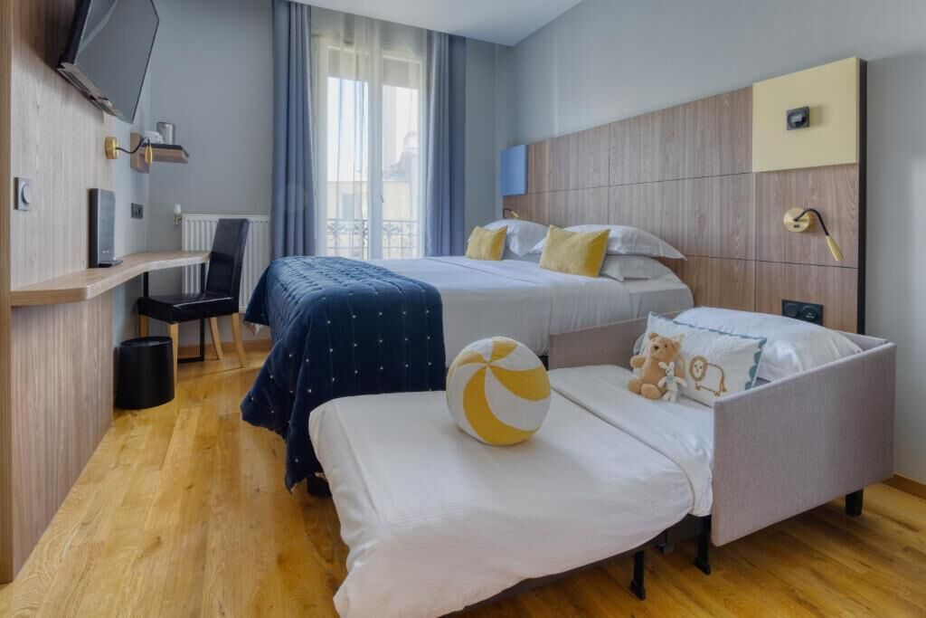 Chambre Triple Cosy, vue Ville | Coffres-forts dans les chambres, chambres insonorisées