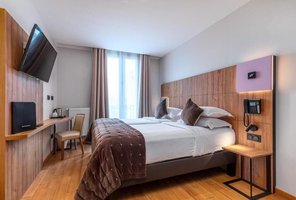 Chambre Confort avec lits jumeaux, vue ville | Coffres-forts dans les chambres, chambres insonorisées