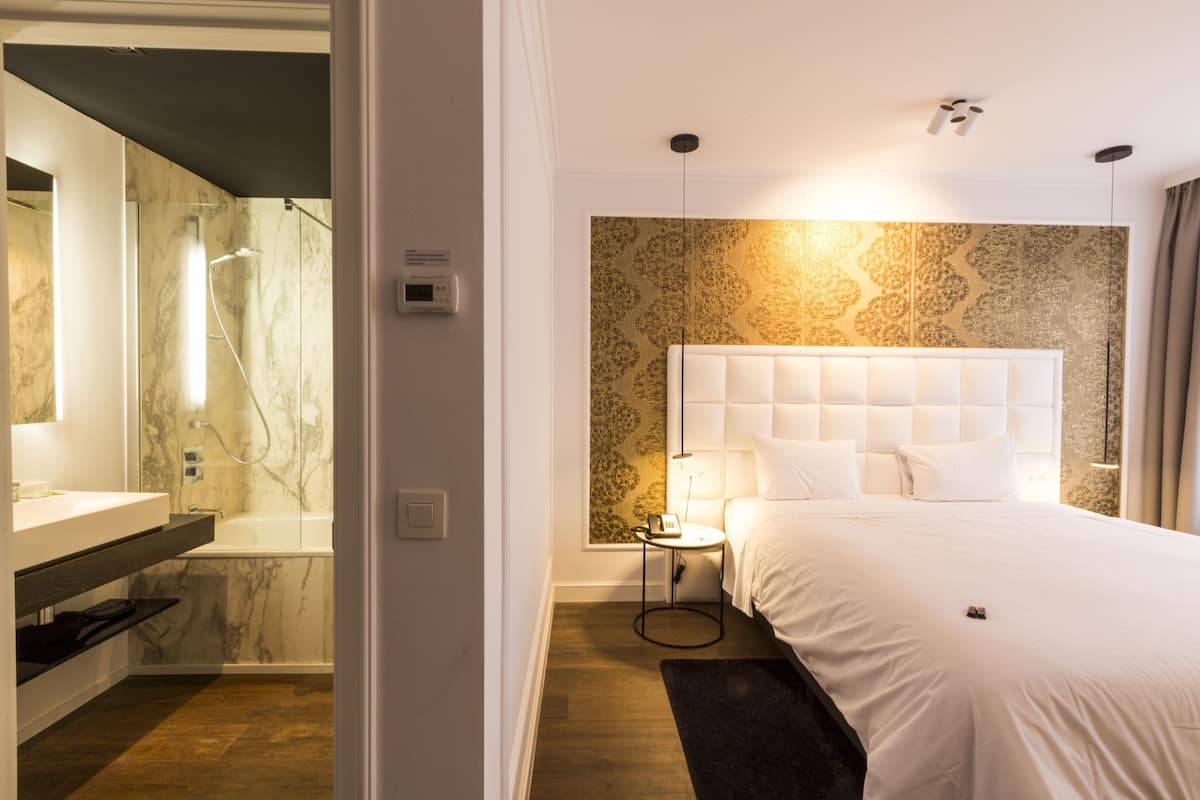 Habitación Deluxe, terraza, en la zona del jardín | Ropa de cama hipoalergénica, minibar, caja fuerte