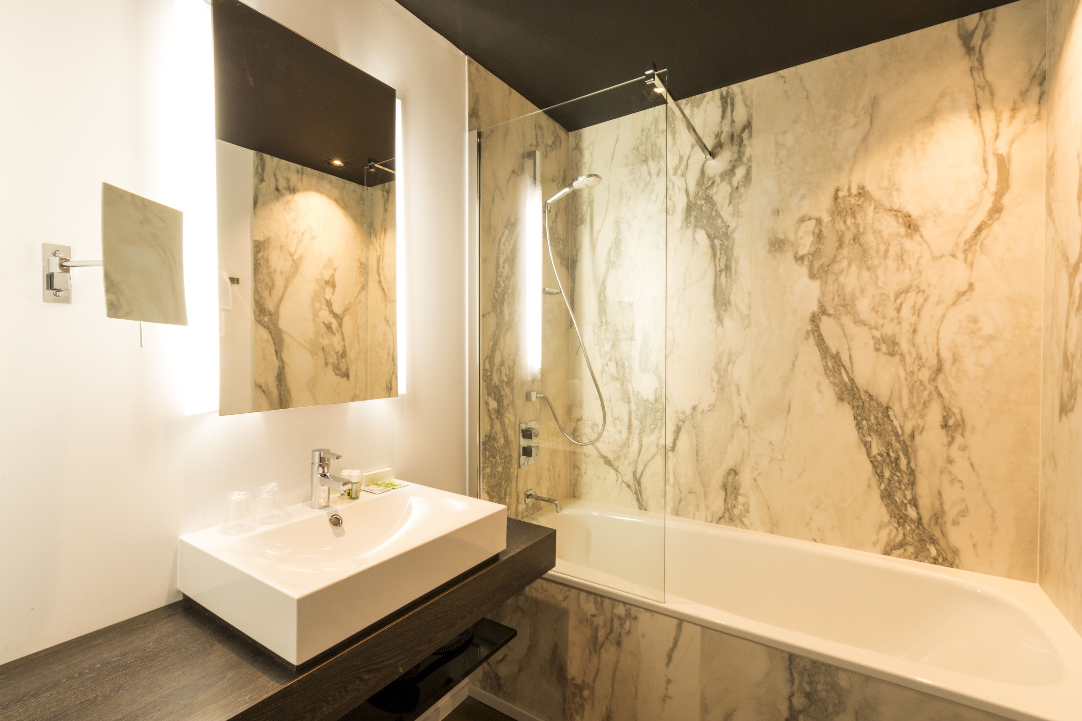 deep-soaking bathtub, eco-friendly toiletries, hair dryer, towels