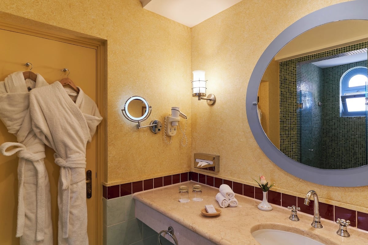 shower, eco-friendly toiletries, hair dryer, slippers