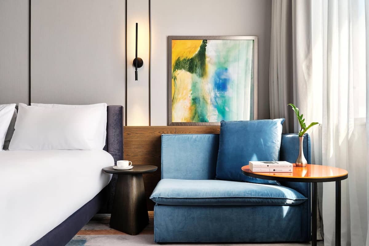 Premium bedding, memory-foam beds, minibar, in-room safe