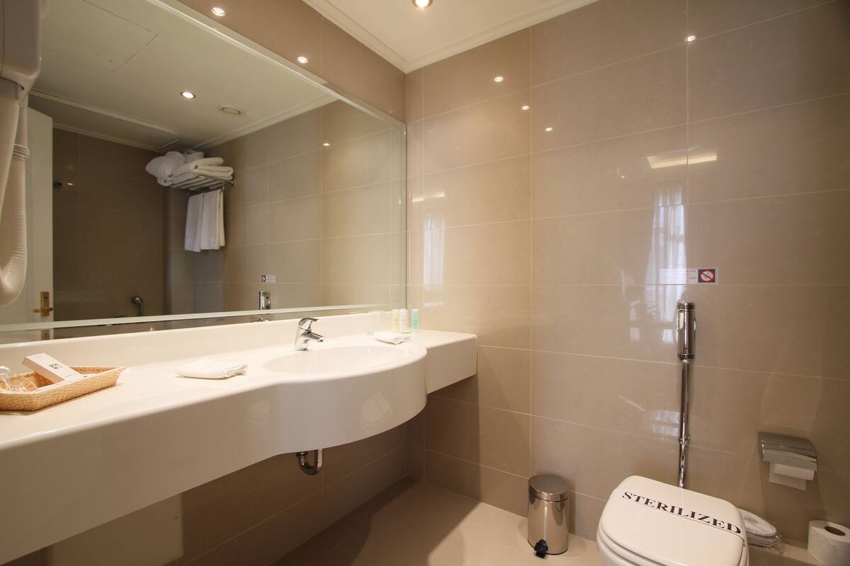 free toiletries, hair dryer, slippers, towels