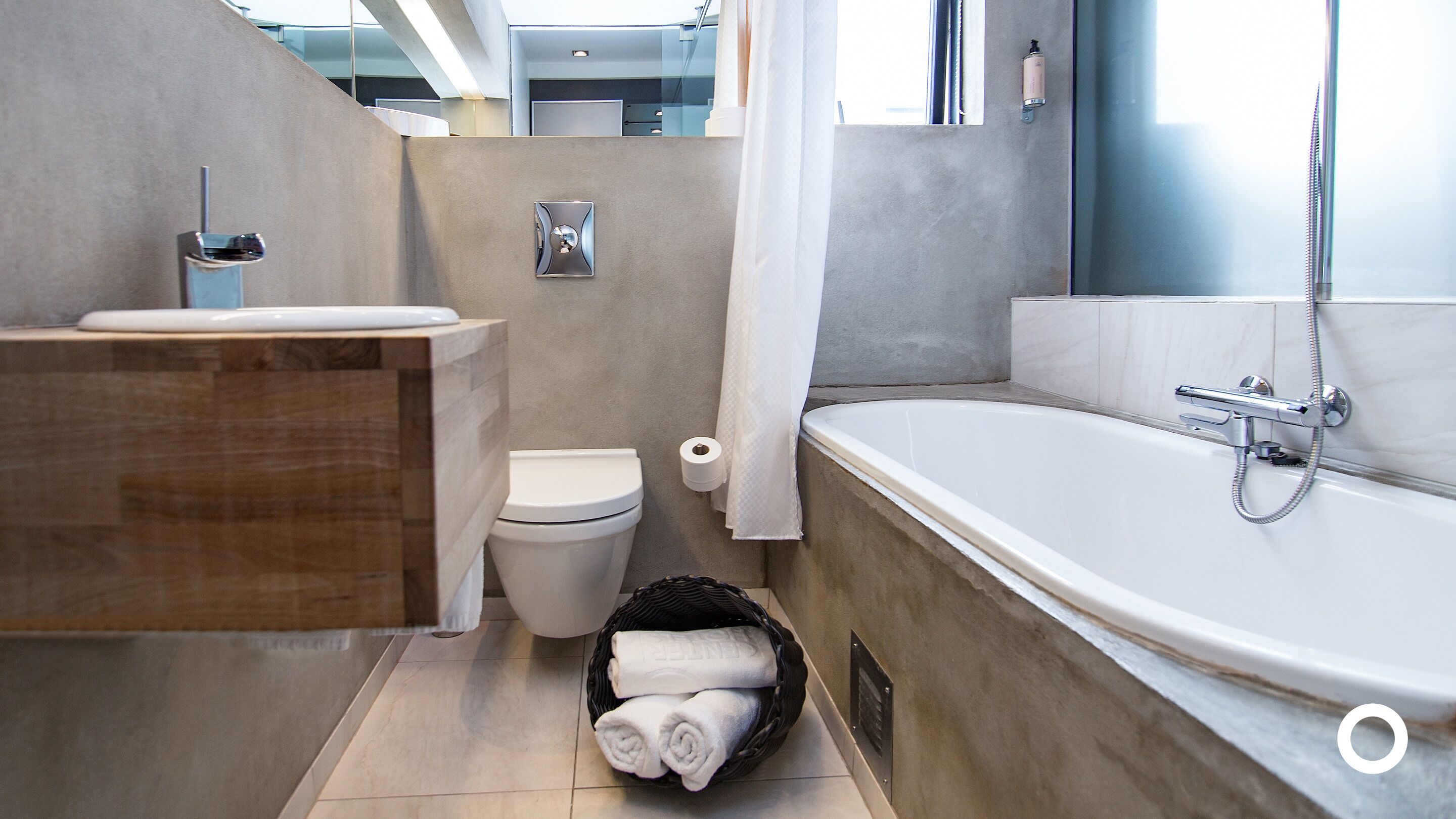 junior suite | bathroom | eco-friendly toiletries, hair dryer, bathrobes, towels