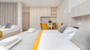 Family Quadruple Room | 1 bedroom, laptop workspace, iron/ironing board, free WiFi