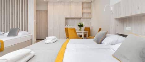 Family Quadruple Room | Laptop workspace, iron/ironing board, free WiFi, bed sheets