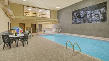 Indoor pool, open 8 AM to 10 PM, pool loungers