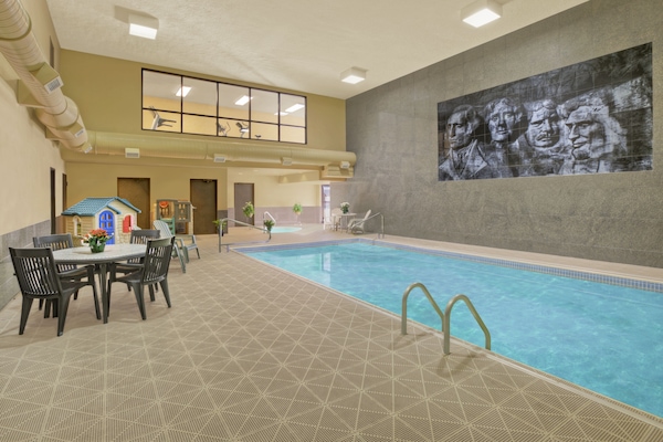 Indoor pool, open 8 AM to 10 PM, pool loungers