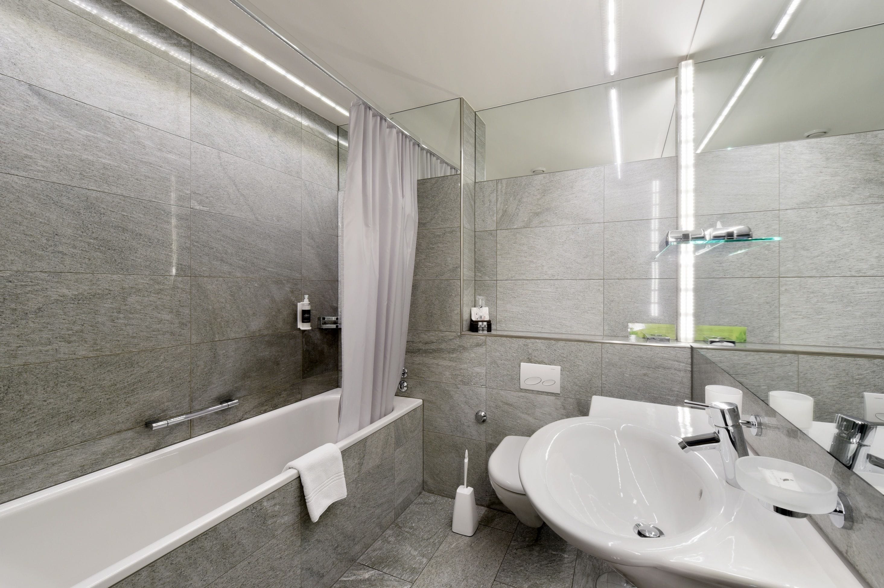 superior single room | bathroom | eco-friendly toiletries, hair dryer, slippers, towels