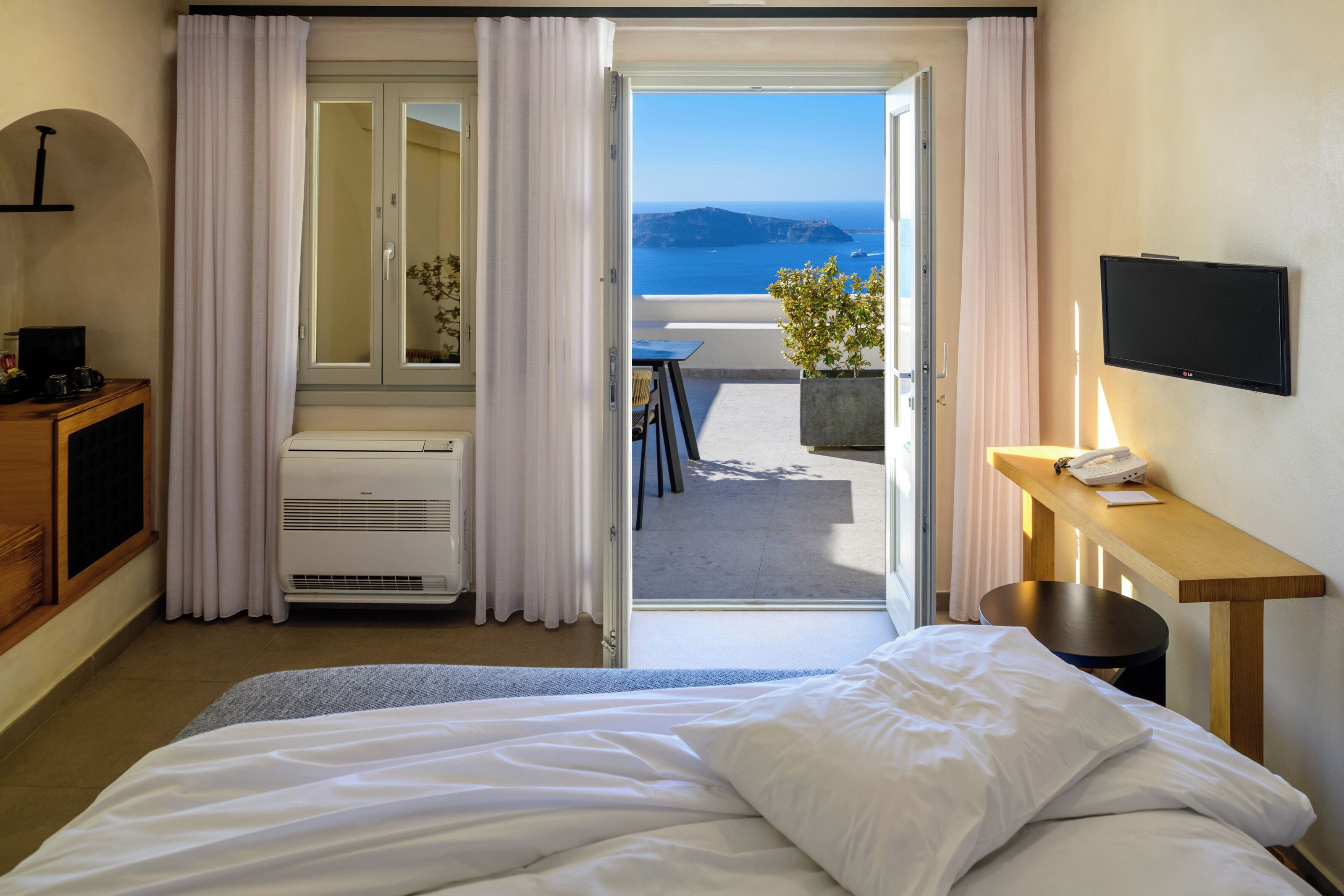 Luxe beddengoed, pillowtop-bedden, een kluis op de kamer