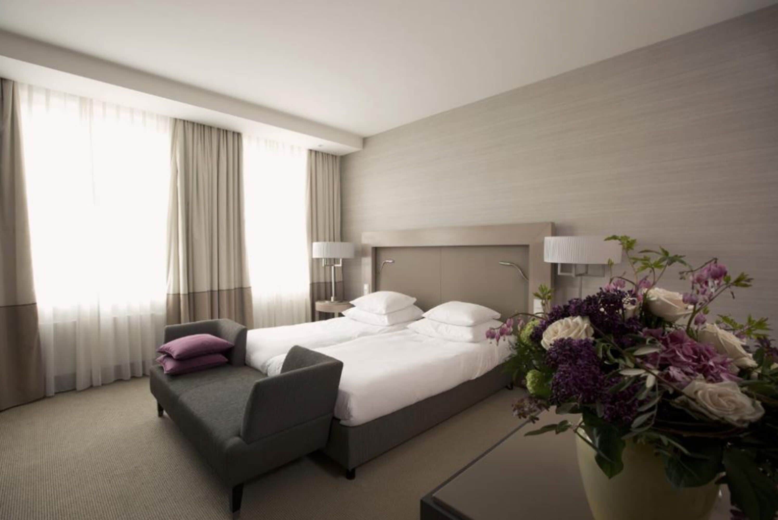 deluxe room, 1 queen bed | premium bedding, minibar, in-room safe, desk