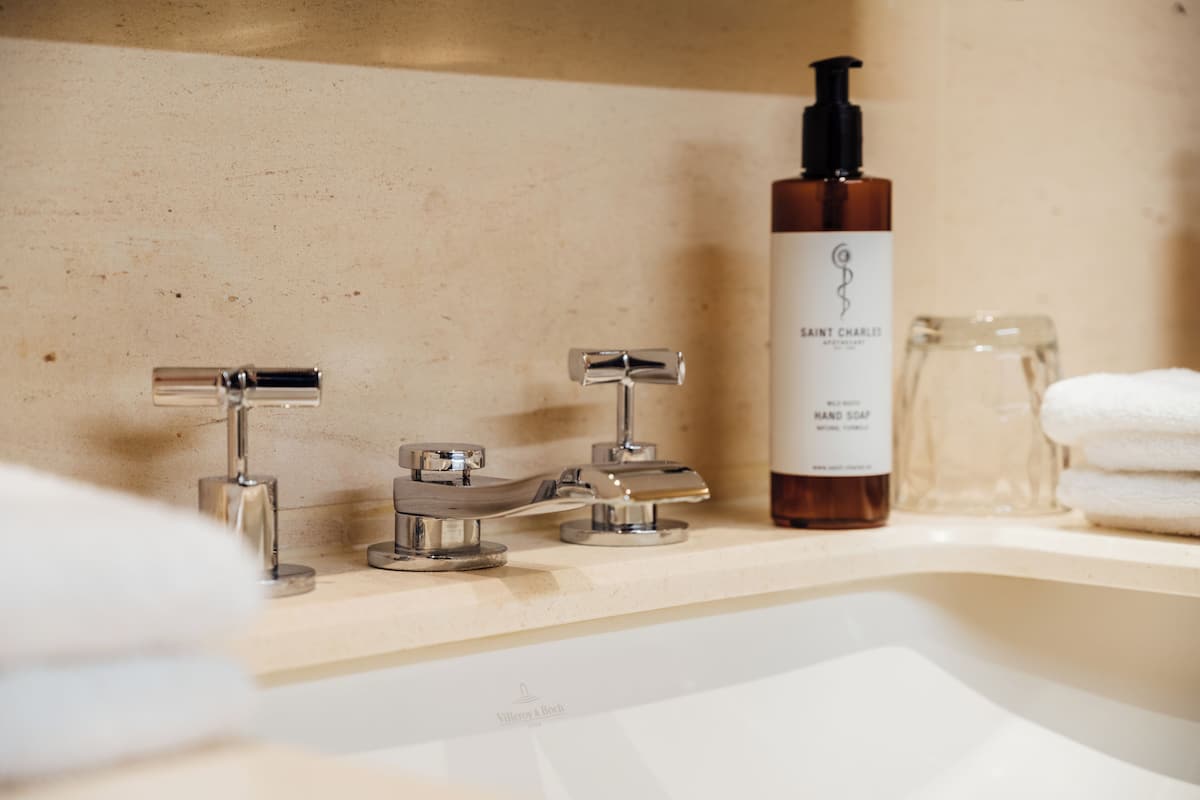 deep-soaking bathtub, rainfall showerhead, free toiletries, hair dryer