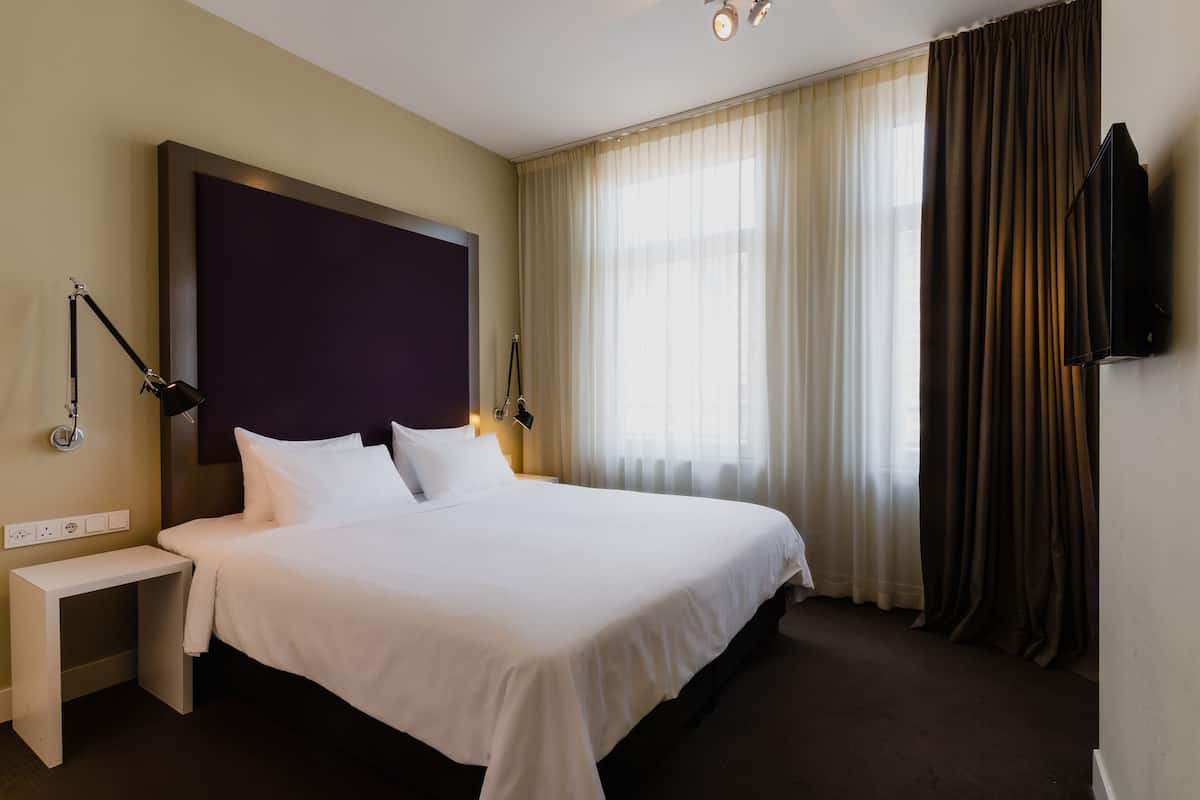 Family Room, Annex Building (Street View) | 1 bedroom, hypo-allergenic bedding, in-room safe, individually decorated