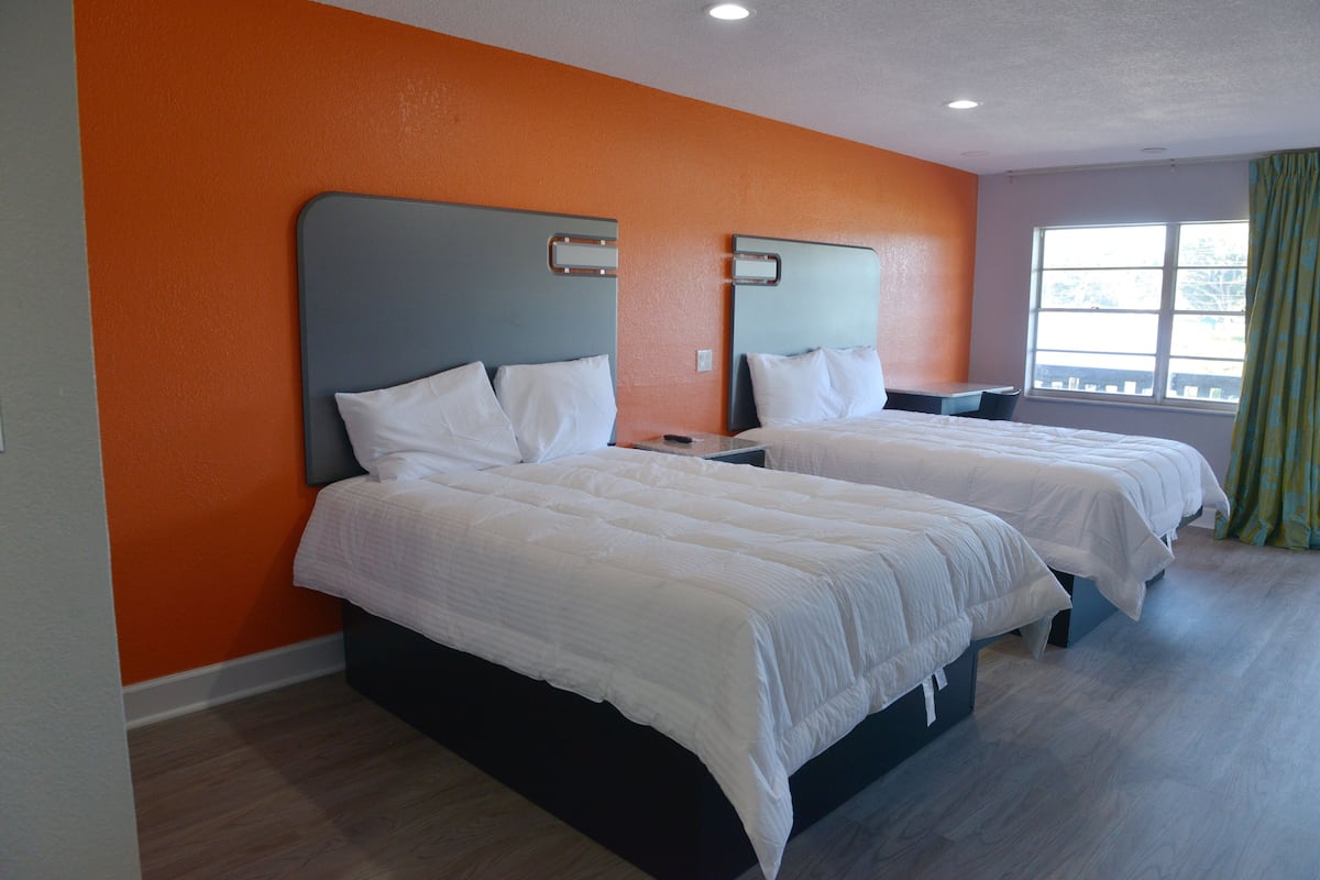 Room, 2 Queen Beds, Non Smoking | Desk, laptop workspace, iron/ironing board (on request), WiFi (free)