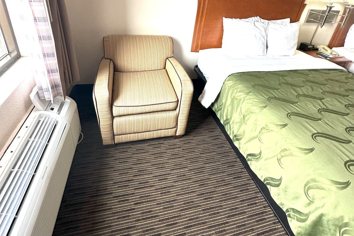 Individually furnished, desk, laptop workspace, iron/ironing board