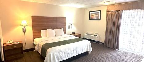 Individually furnished, desk, laptop workspace, iron/ironing board