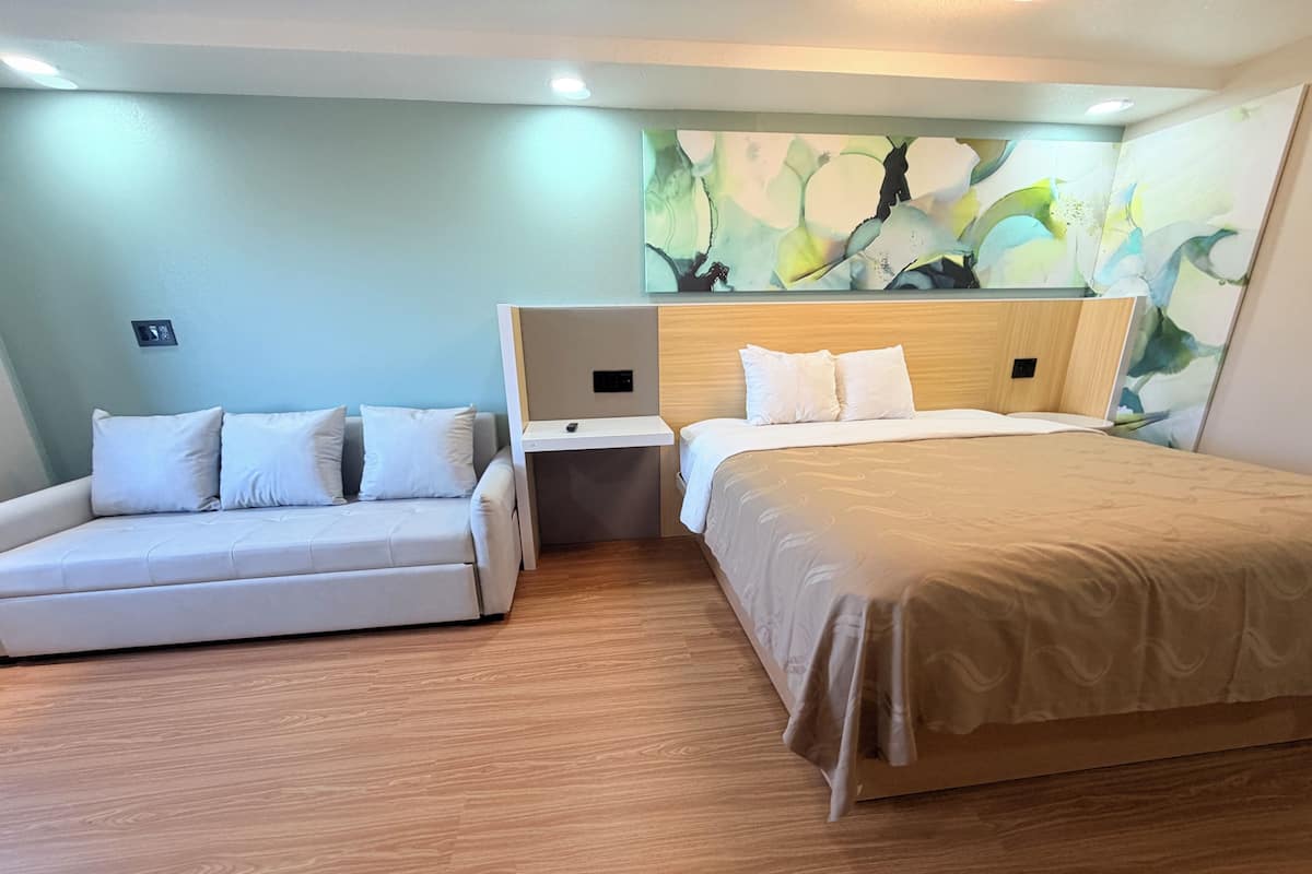 Individually furnished, desk, laptop workspace, iron/ironing board