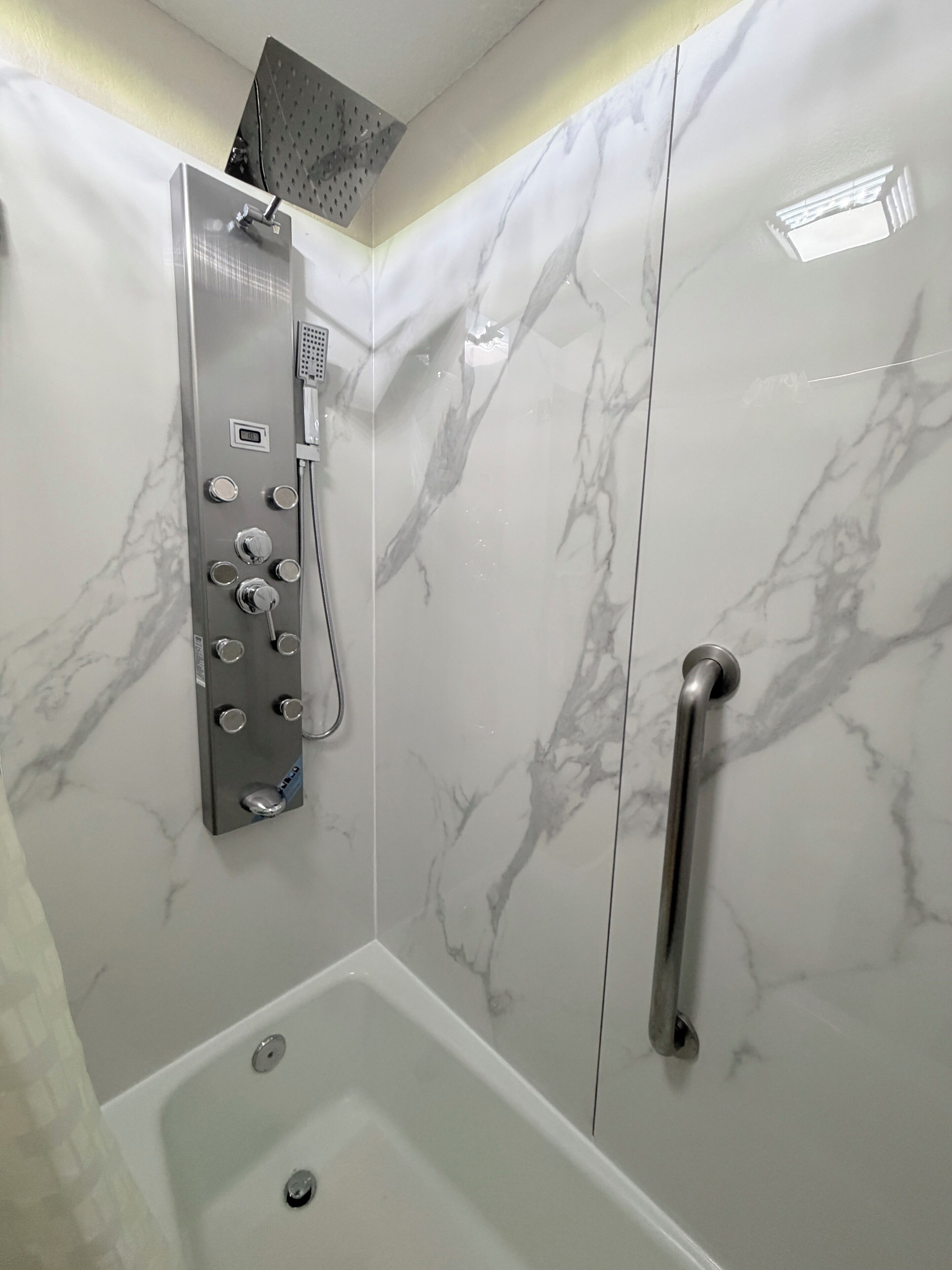 A shower with a handheld showerhead, a handheld showerhead, a handheld showerhead, a handheld showerhead, a handheld showerhead, a handheld showerhead, a handheld showerhead, a handheld showerhead, a handheld showerhead, a handheld showerhead, a handheld showerhead, a handheld showerhead, a handheld showerhead, a handheld showerhead, a handheld showerhead, a handheld showerhead, a handheld showerhead, a handheld showerhead, a handheld showerhead, a handheld showerhead, a handheld showerhead, a handheld showerhead, a handheld showerhead, a handheld showerhead, a handheld showerhead, a handheld showerhead, a handheld showerhead, a handheld showerhead, a handheld showerhead, a handheld showerhead, a handheld showerhead, a handheld showerhead, a handheld showerhead, a handheld showerhead, a handheld showerhead, a handheld showerhead, a handheld showerhead, a handheld showerhead, a handheld showerhead