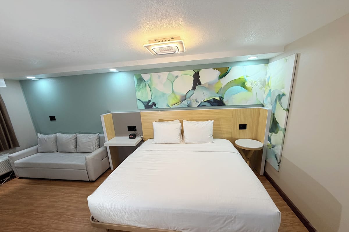 Individually furnished, desk, laptop workspace, iron/ironing board