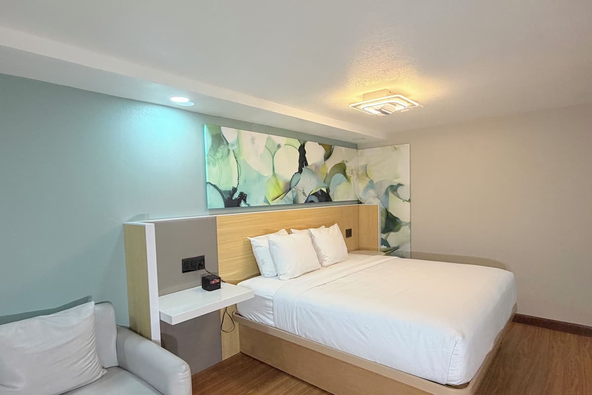 Individually furnished, desk, laptop workspace, iron/ironing board