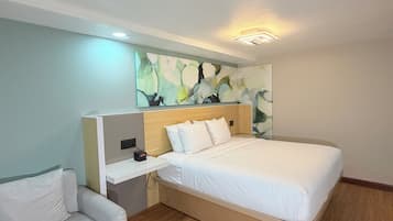 Individually furnished, desk, laptop workspace, iron/ironing board