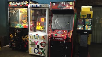 Enjoy classic arcade games like Hot Stuff, Tic Tac Toe, and Jurassic Park in our entertainment area.