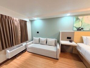 Individually furnished, desk, laptop workspace, iron/ironing board