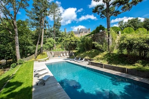 Seasonal outdoor pool, pool umbrellas, pool loungers